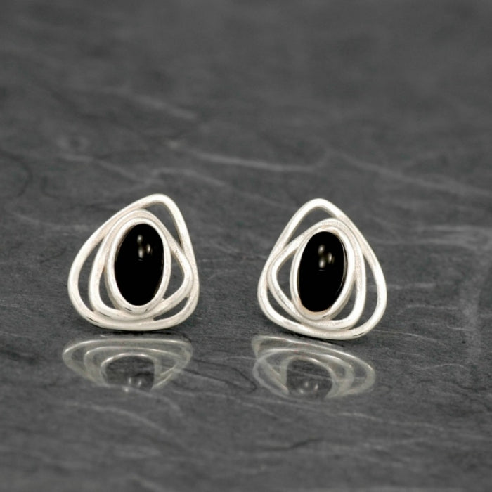 Girotondo, Pendientes de presión, triangulares