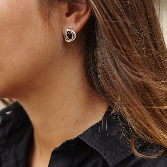 Girotondo, Pendientes de presión, triangulares