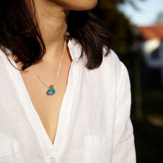 Menina, Colgante mediano