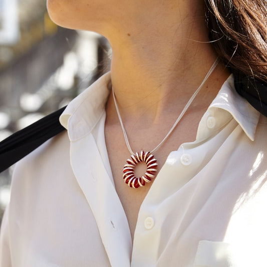 Omnia Pasión, Colgante redondo